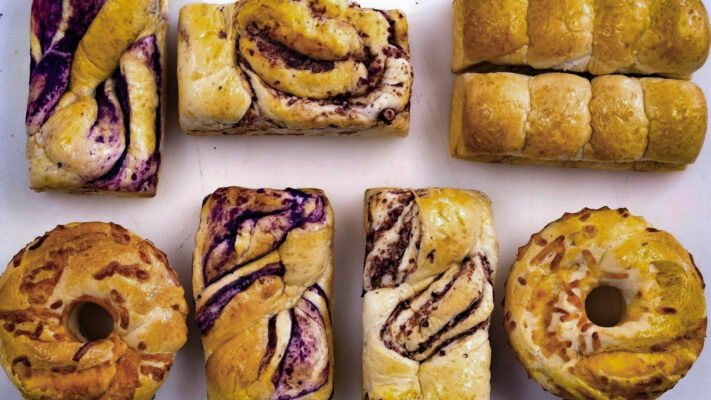 a variety of bread loaves on a table