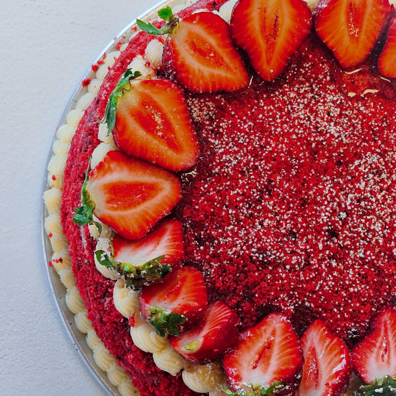 a vibrant strawberry cake on a table