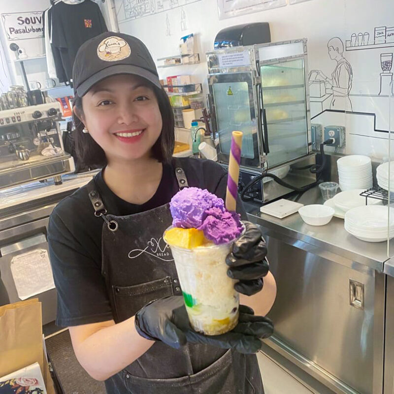 Women holding a purple dessert drink